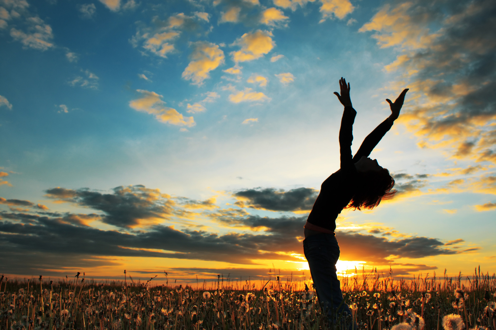 Young woman under sunset light